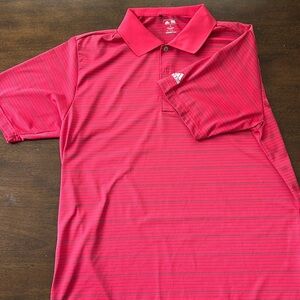 Golf polo, size medium. No stains or sign of wear.